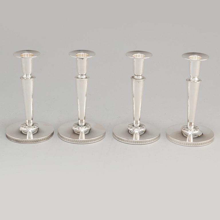 a set of four silver candlesticks by Ceson Gothenburg 1985-1987.