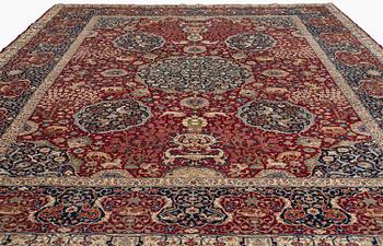 A semi-antique Benlian Tabriz carpet, signed Jabarzade, c. 416 x 308 cm.