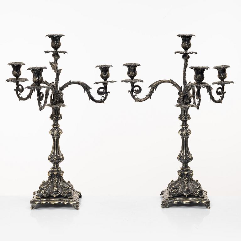 A pair of silver plated Rococo style candelabra, 20th century.