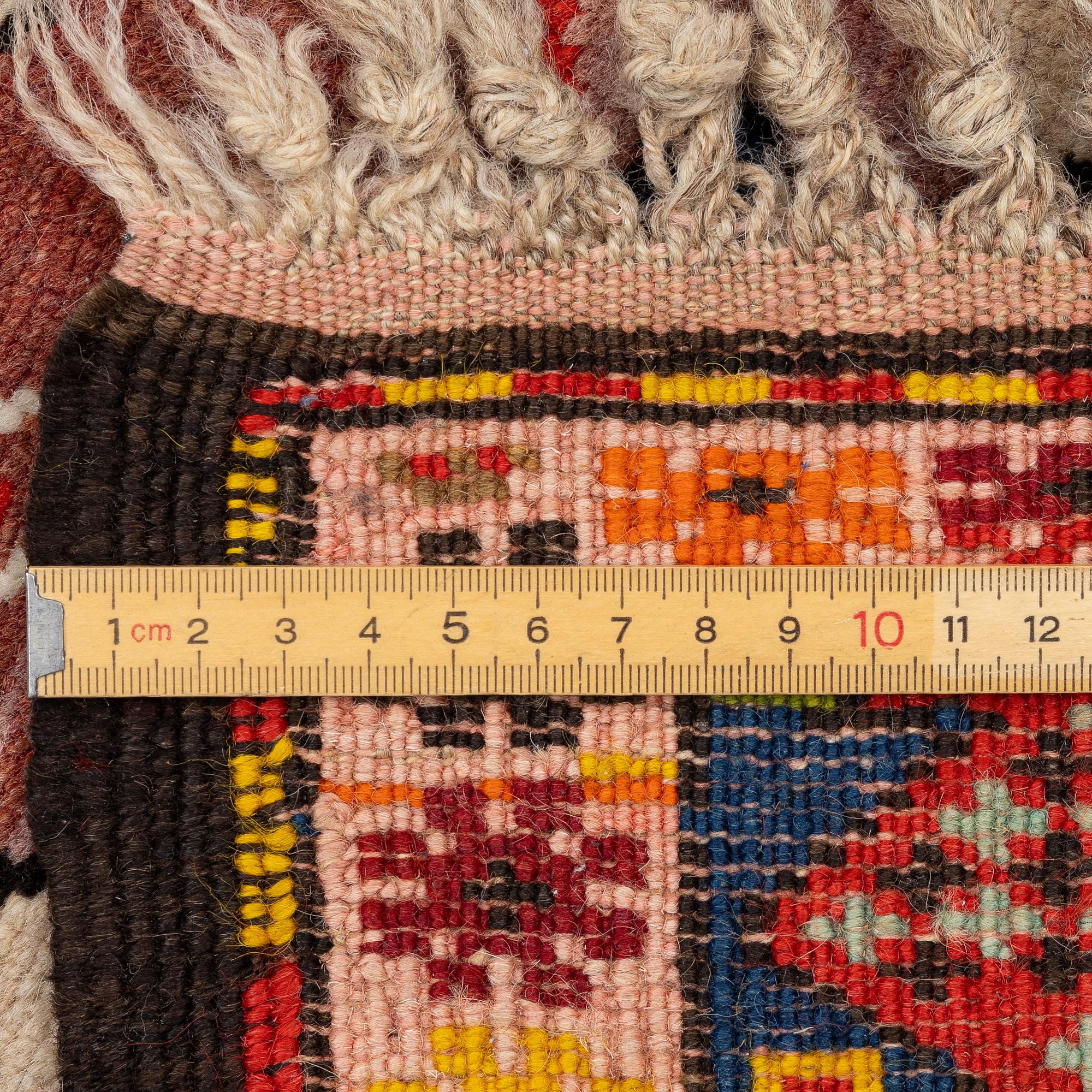 Caucasian runner, approx. 340 x 138 cm.