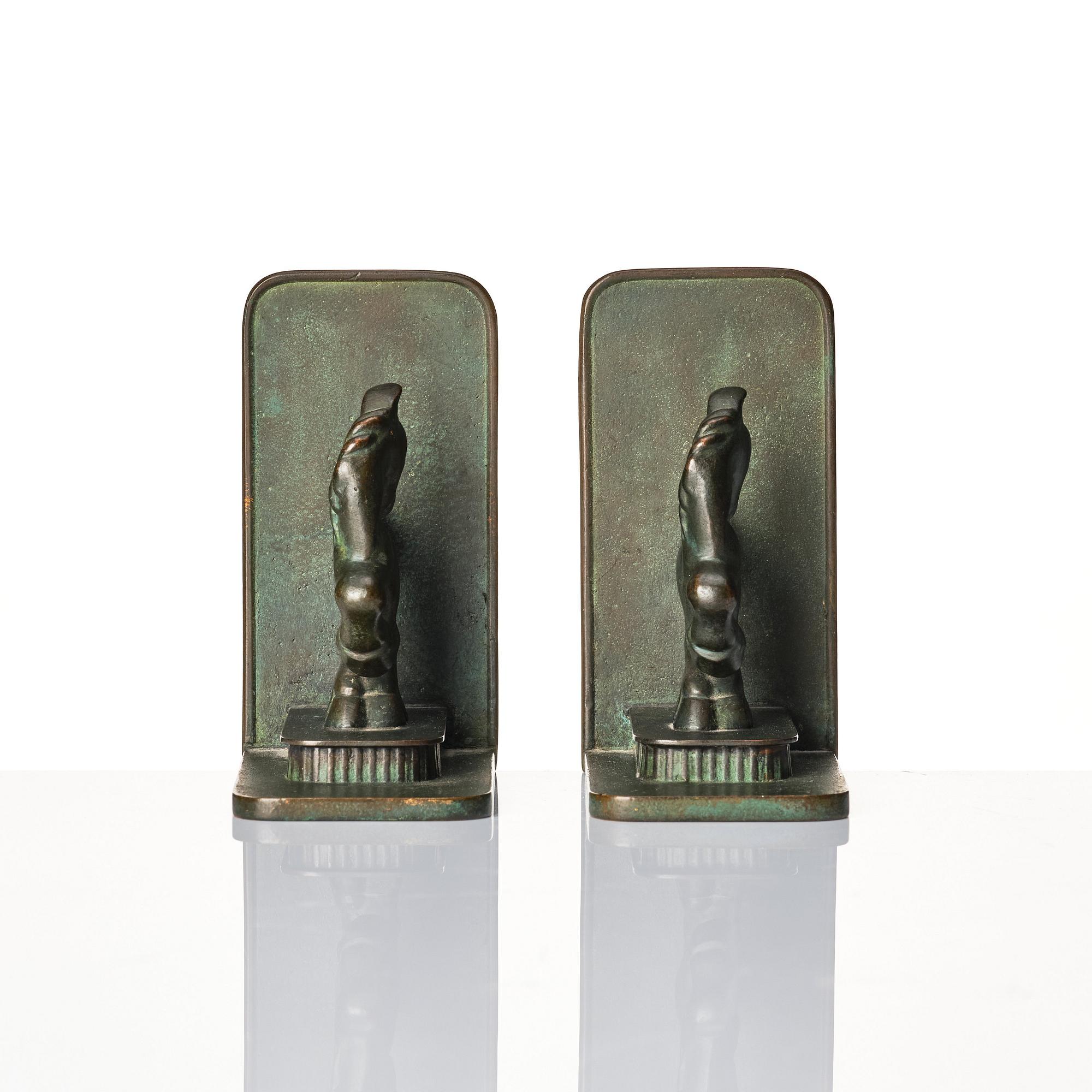 Carl-Einar Borgström, a pair of patinated bronze bookends, Ystad Brons, 1930-40s.