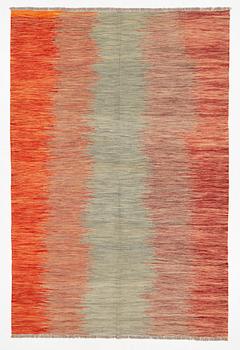 A kilim carpet, 304 x 203 cm.