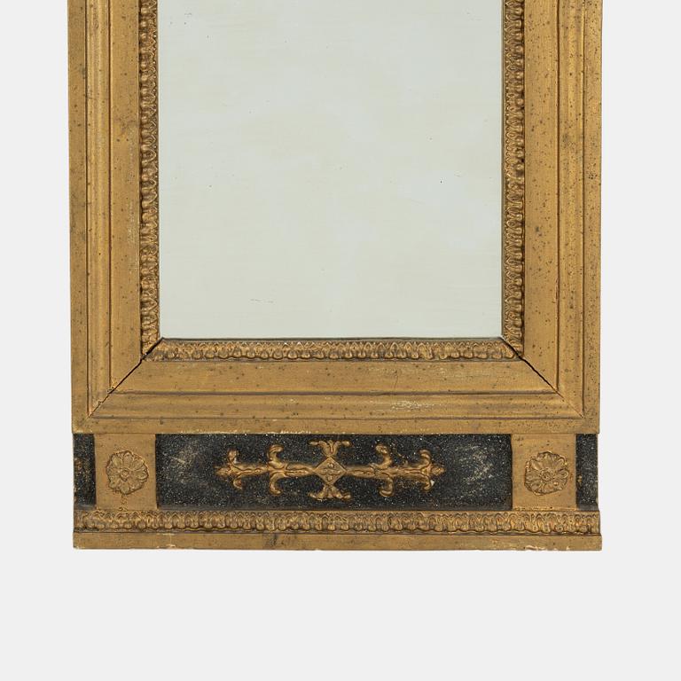 A Swedish Empire mirror, first half of the 19th Century.