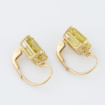 A pair of praseolite quartz and brilliant cut diamond earrings.