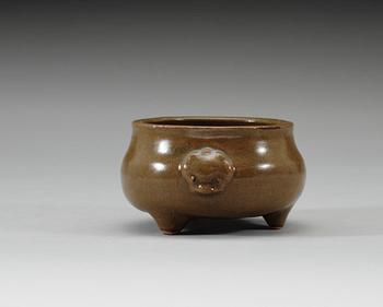 A teadust tripod censer, Qing dynasty, Qianlong (1736-95).