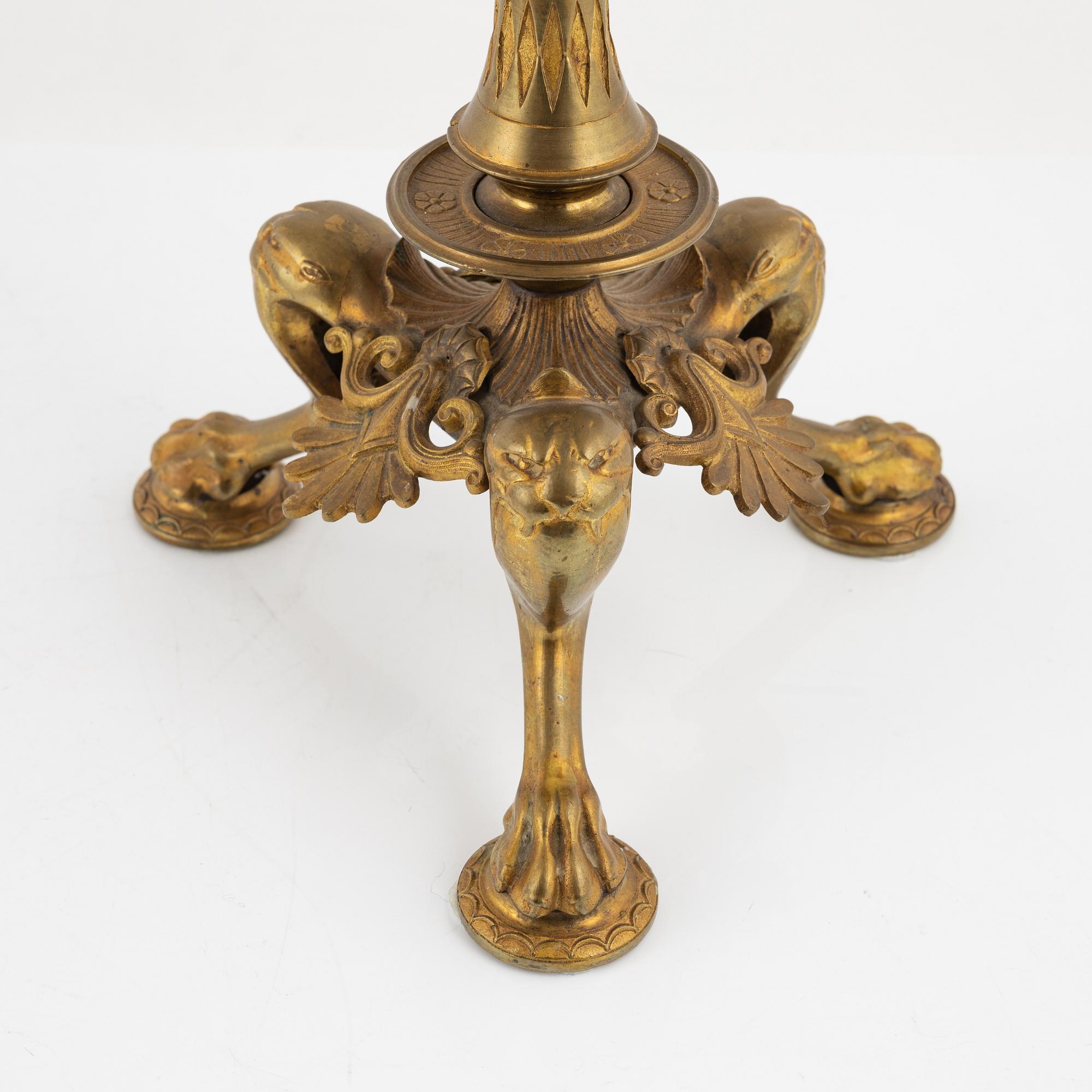 A pair of bronze candelabra, late 19th Century.