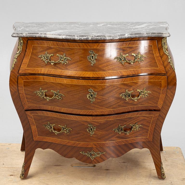 A Rococo style chest of drawers, first half of the 20th century.