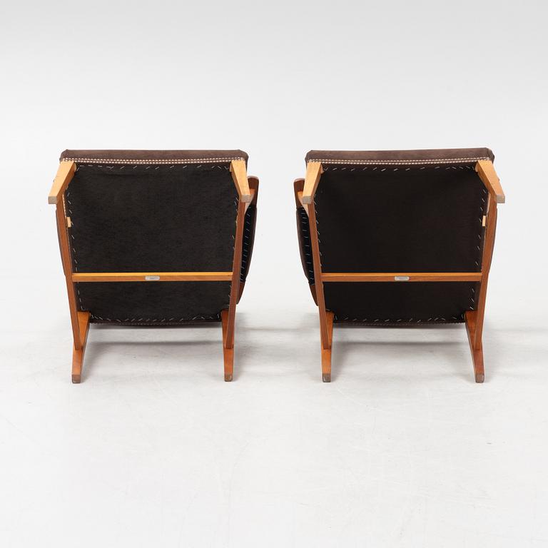 Josef Frank, a pair of model 695 armchairs, Firma Svenskt Tenn, Sweden.