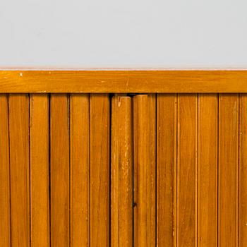 A mid-20th century radio cabinet.