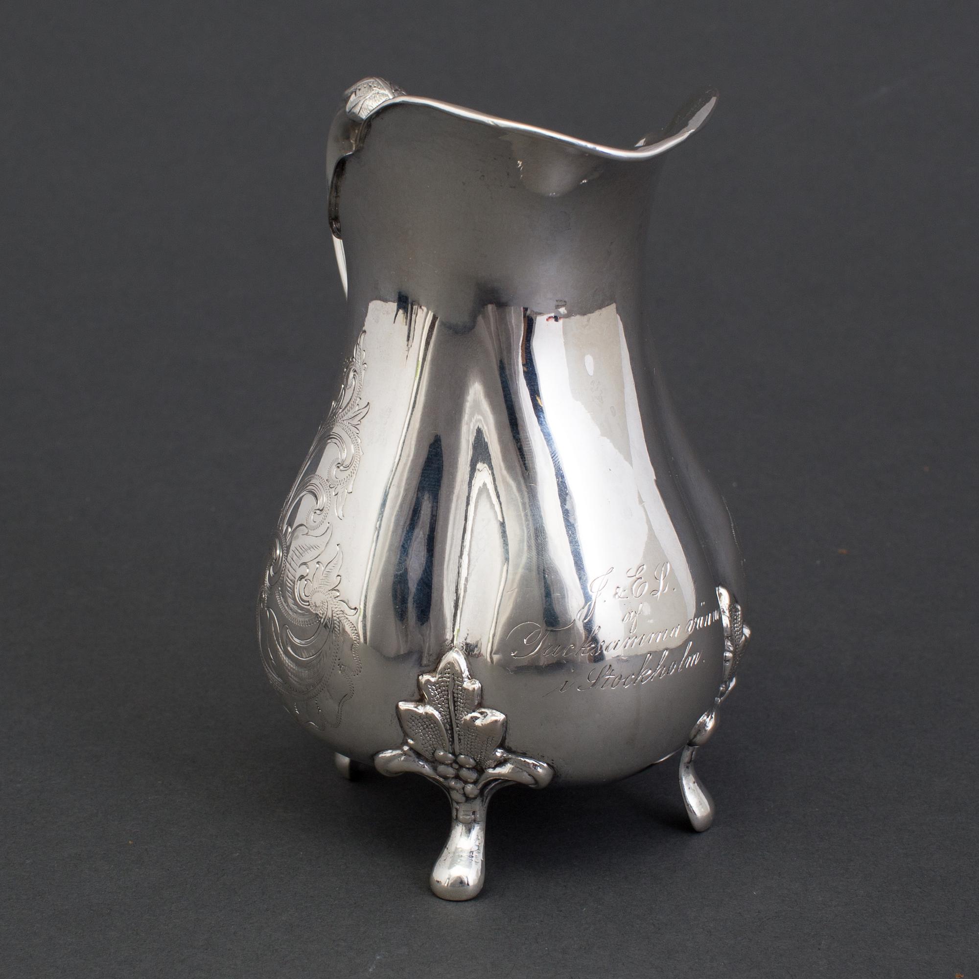 a silver cream pot by Johan Theodor Folcker Stockholm 1864. Weight 128 ...