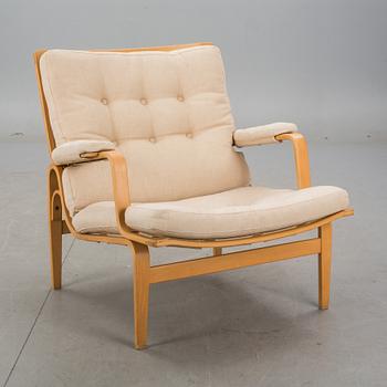 FÅTÖLJ. "Ingrid", Bruno Mathsson för DUX, 1900-talets andra hälft.