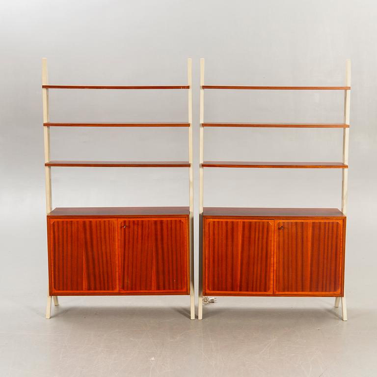 A pair of IKEa "Roxen 1960s mahgony book cases.