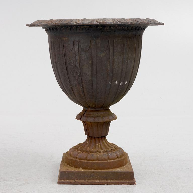 A cast iron palnter, 20th Century.