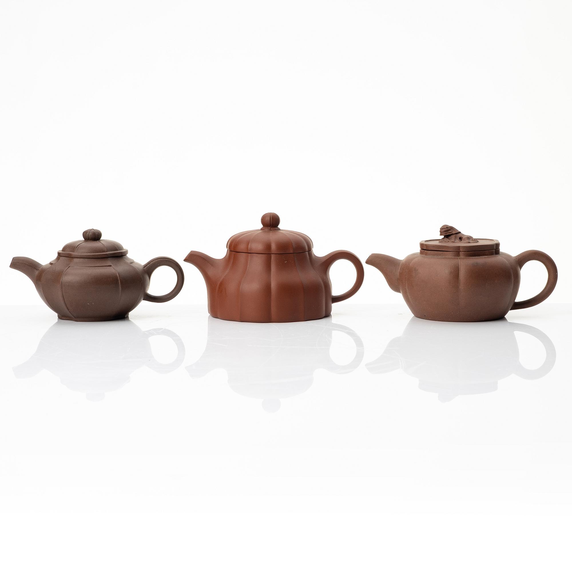A group of three yixing teapots, China, 1980s.