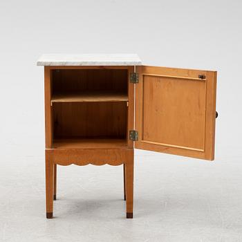 An early 20th Century bedside cabinet.