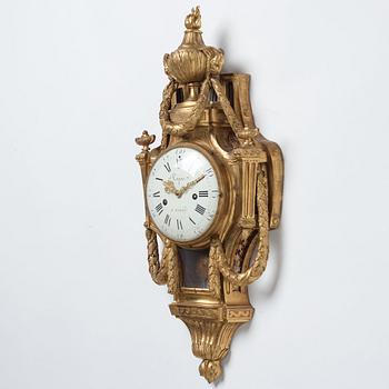 A Louis XVI gilt bronze wall clock by Jean Joseph Léonard Roque, active 1770-89.