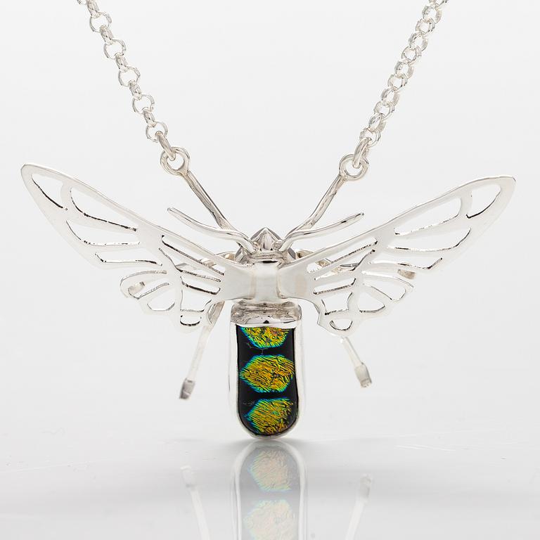 A sterling silver necklace "Moth" with dichroic glass. Ru Runeberg 2019.