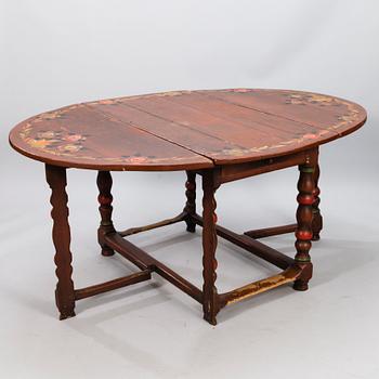 A painted 18th Century Baroque gate leg table.