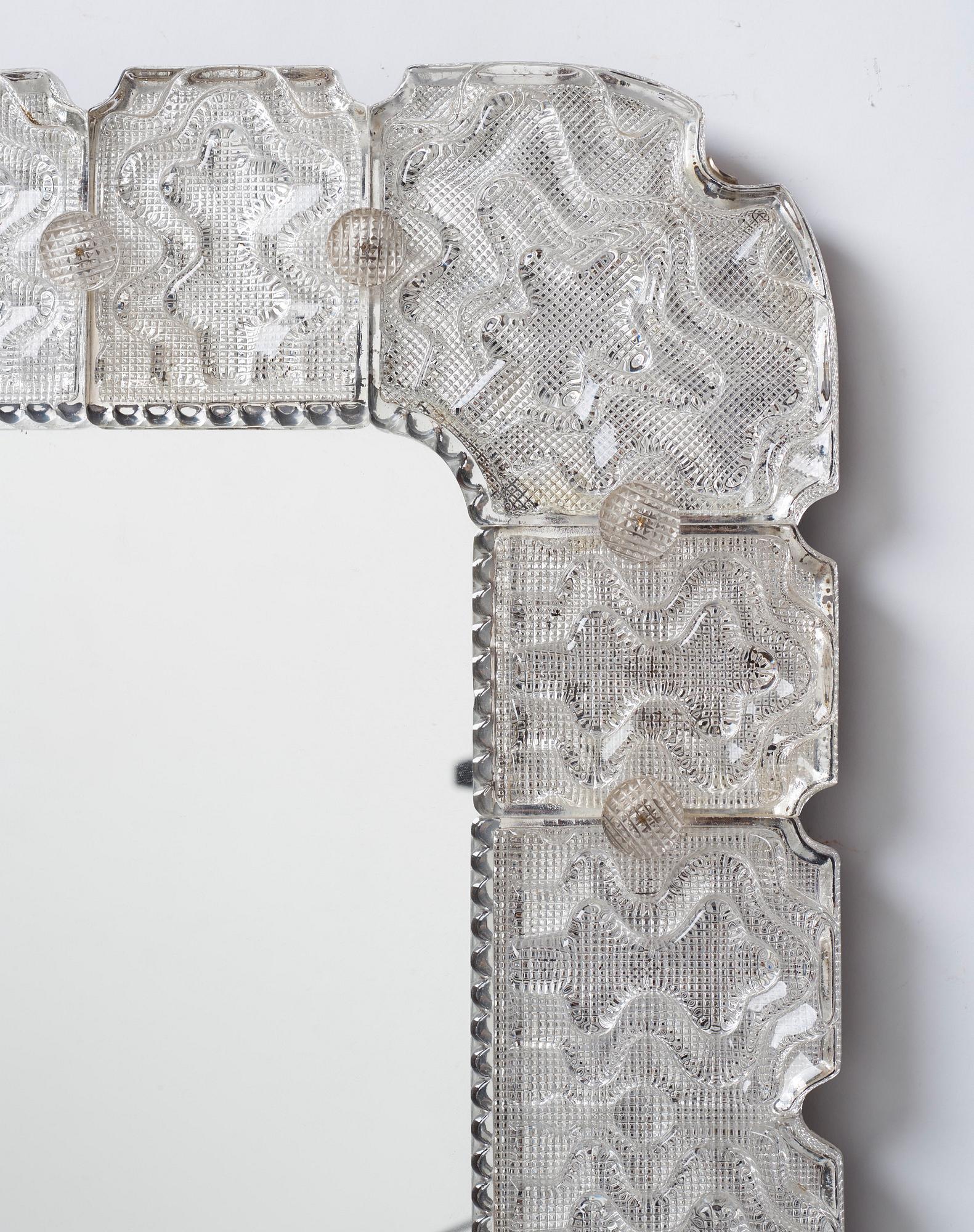 Carl Fagerlund, a Swedish Modern cast glass framed mirror, Orrefors ca 1940-50's.
