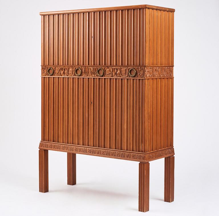 A Swedish Modern stained pine cabinet, 1940s.