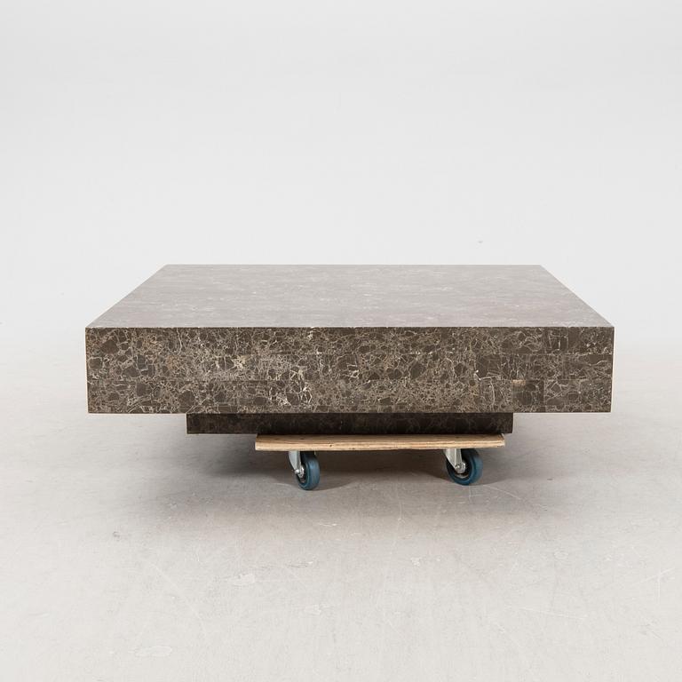 A late 20th century travertine coffee table.