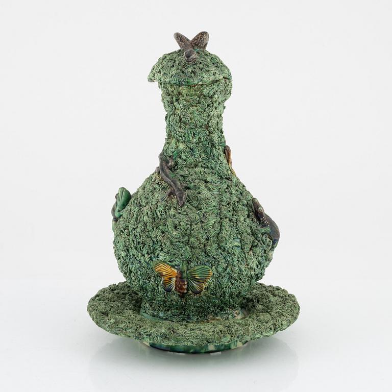 A majolica ewer with cover and stand, M. Mafra, Caldao, Portugal, late 19th Century.