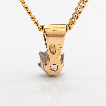 A 14K gold neckalce with a ca. 0.45 ct diamond according to engraving.