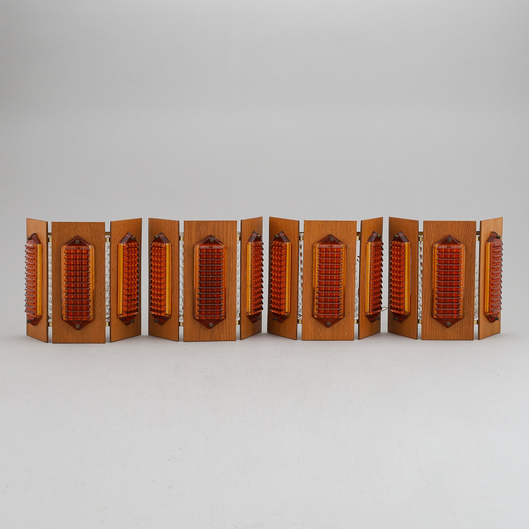Four 1960/70's wall lights.