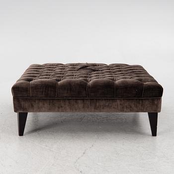 A pouf, contemporary.