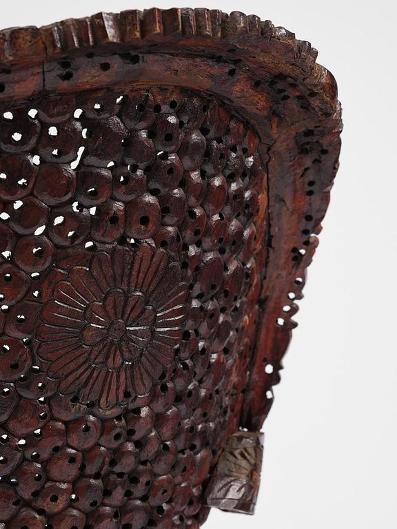 A pair of carved 'blackwood' armchairs, Bombay presidency, British Raj, circa 1880.