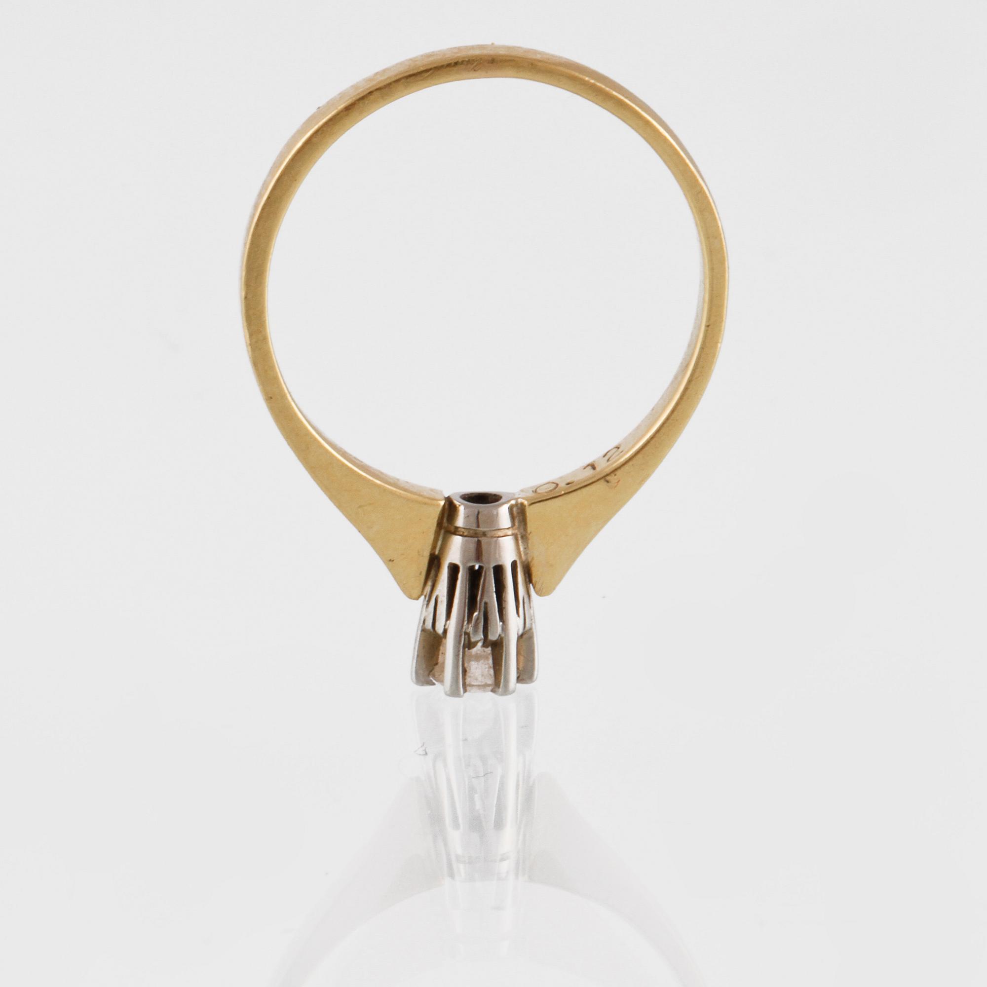 RING, 18K guld och vitguld med briljantslipad diamant 0.12 ct, importstämplad. Vikt 2,3 gram.