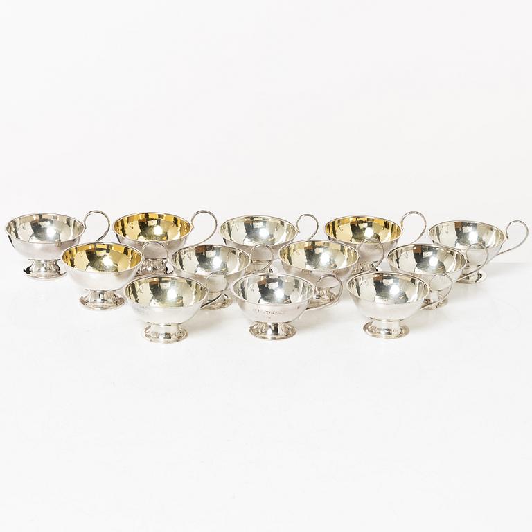 A set of twelve Swedish silver punsch cups, including Ceson, Gothenburg 1989.
