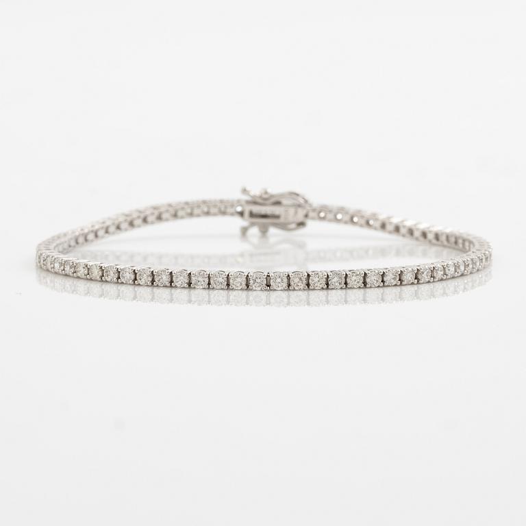 Tennis bracelet 18K white gold with brilliant-cut diamonds.
