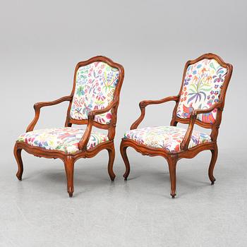 Two 18th century French Louis XV walnut armchairs.