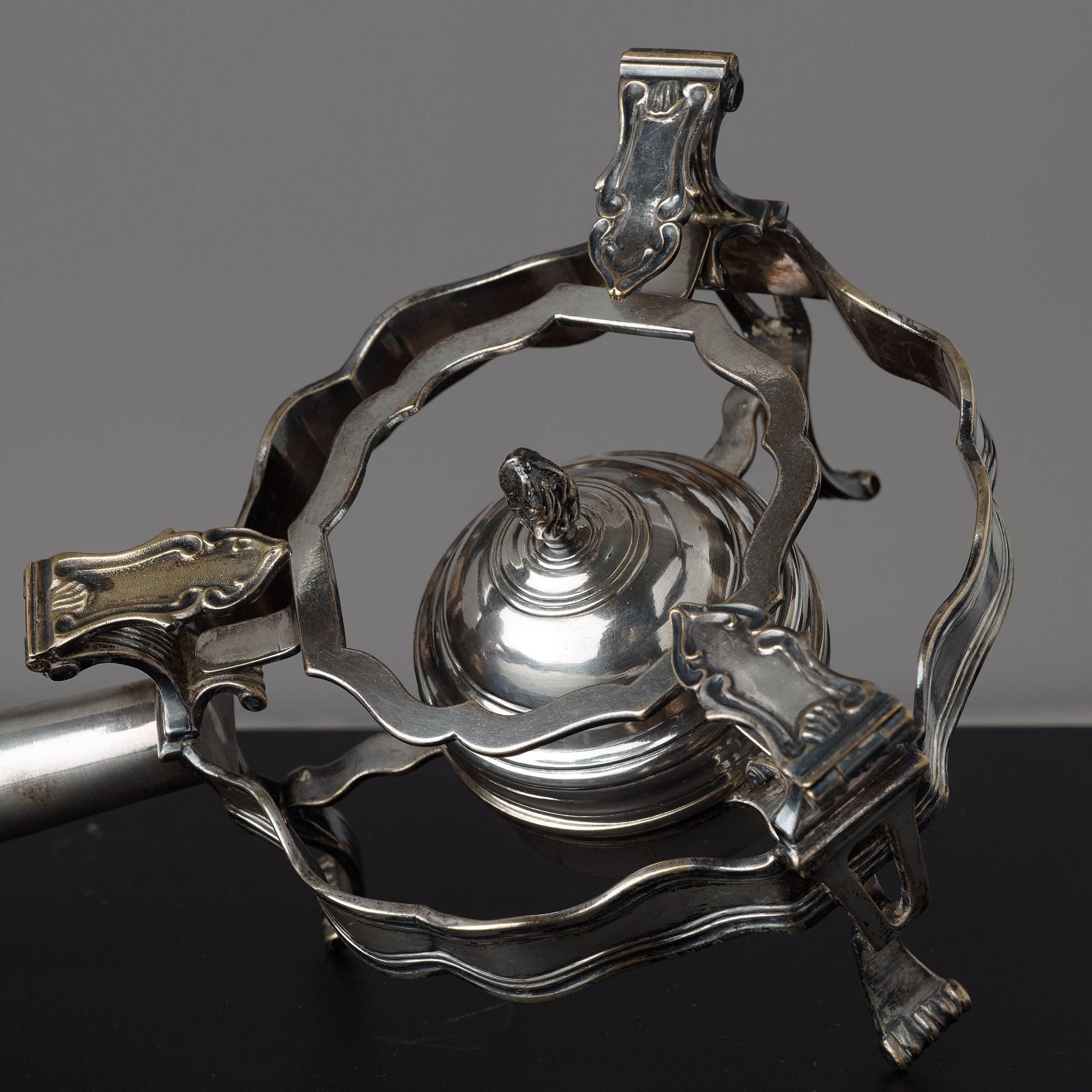 A Rococo 18th century plate warmer.
