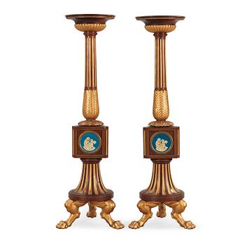 1376. A pair of Empire 19th century candle stands.