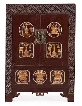 1548. A late Qing dynasty cupboard, 19th Century.