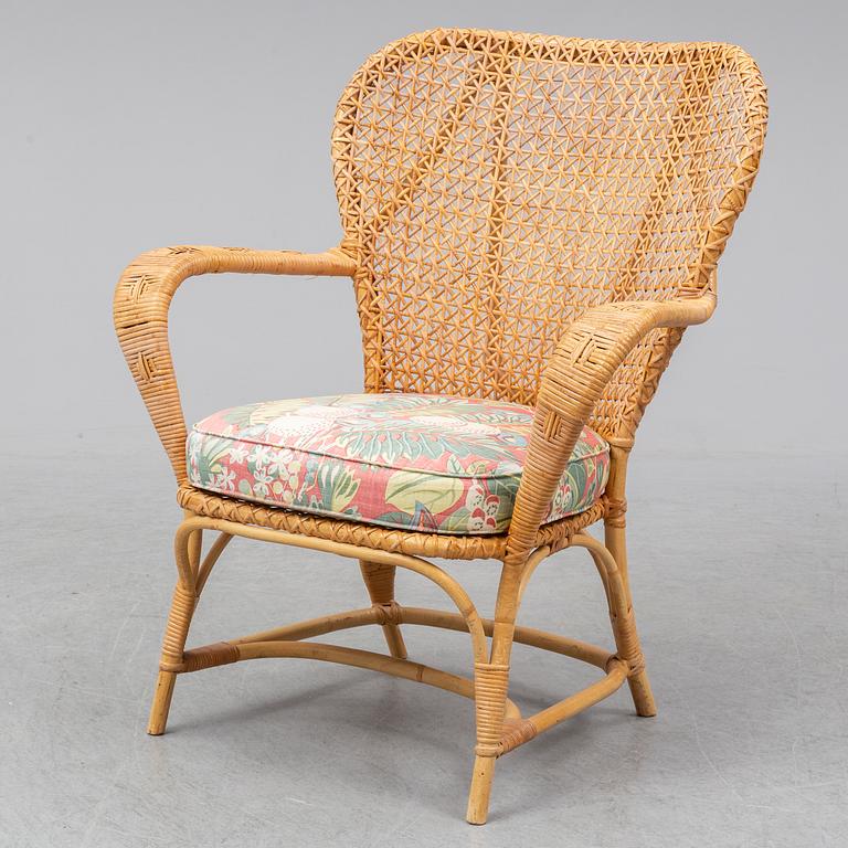 a mid rattan chair by Korgmakare Larsson, Stockholm, mid 20th century.