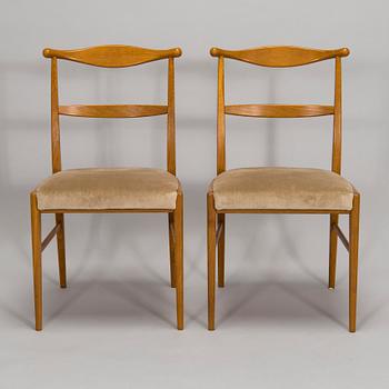 A set of four 1960s oak chairs.