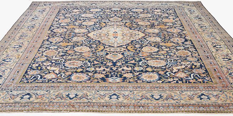 An antique Tabriz carpet, Northwest Persia (Iran), c. 495 x 403 cm.