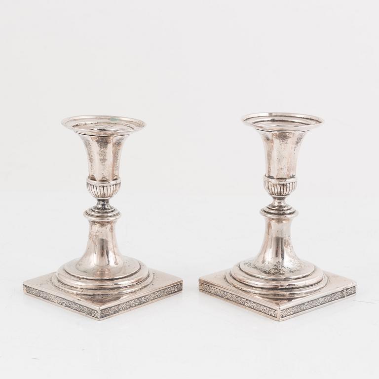 A Pair of Empire Silver Candlesticks, indistinct hallmarks, first half of the 19th Century.