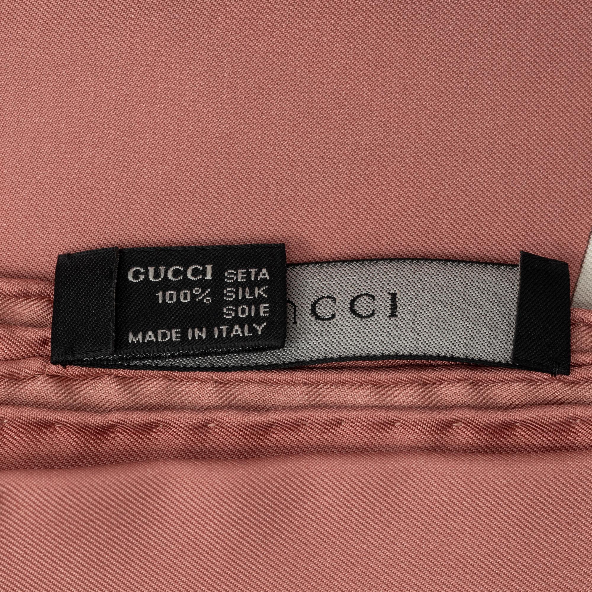 Gucci, a silk scarf.