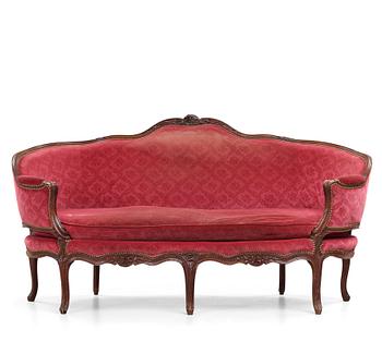 29. A Louis XV mid 18th century sofa.