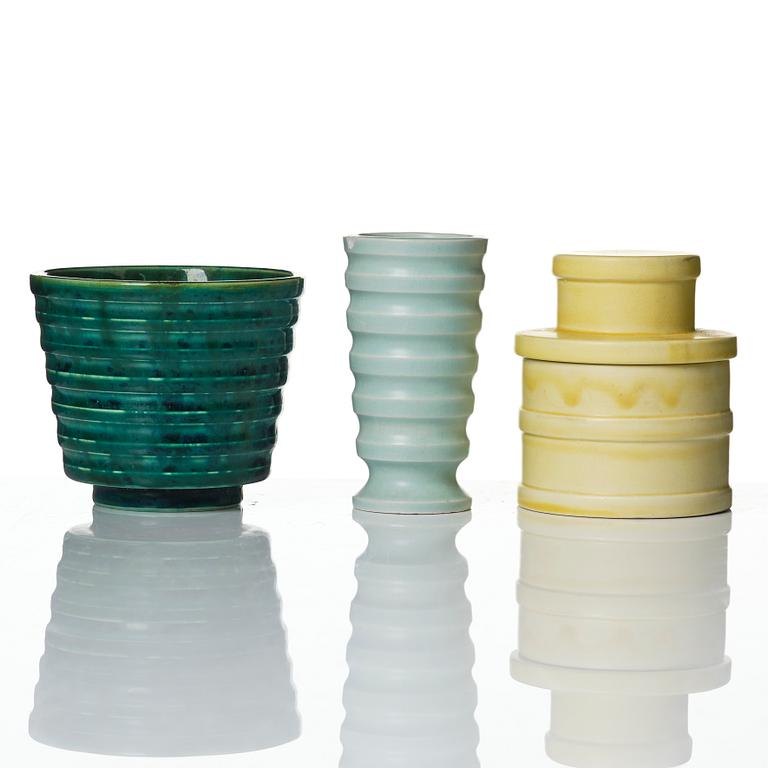 Wilhelm Kåge, A set of three ceramic flower pots, a vase and jar with lid,  Gustavsberg 1930s.