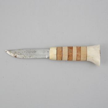 A Sami reindeer horn knife, unidentified signature.