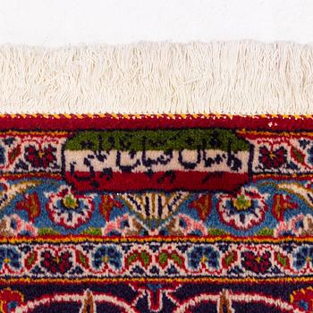 A Kashan carpet signed, approx. 420 x 292 cm.
