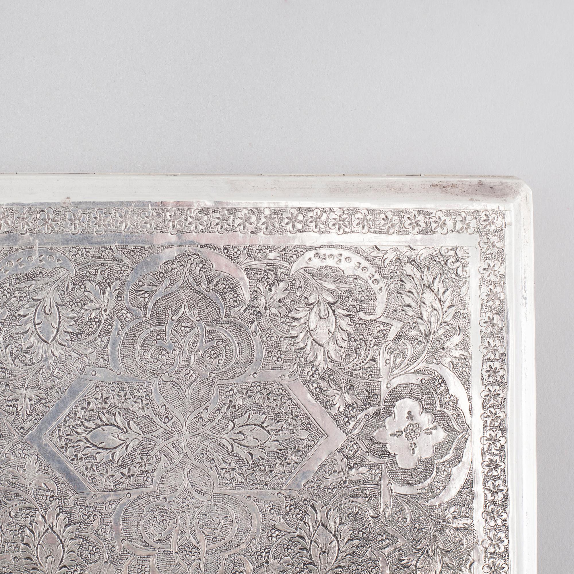 A cigarette case in silver, Persia/Iran, unidentified marks. Total weight 151 g.