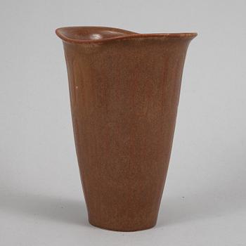 Tea pot, two bowls, two creamers, and a vase by Gunnar Nylund, stoneware, Rörstrand.