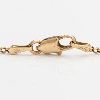 A 14K gold ankle chain.