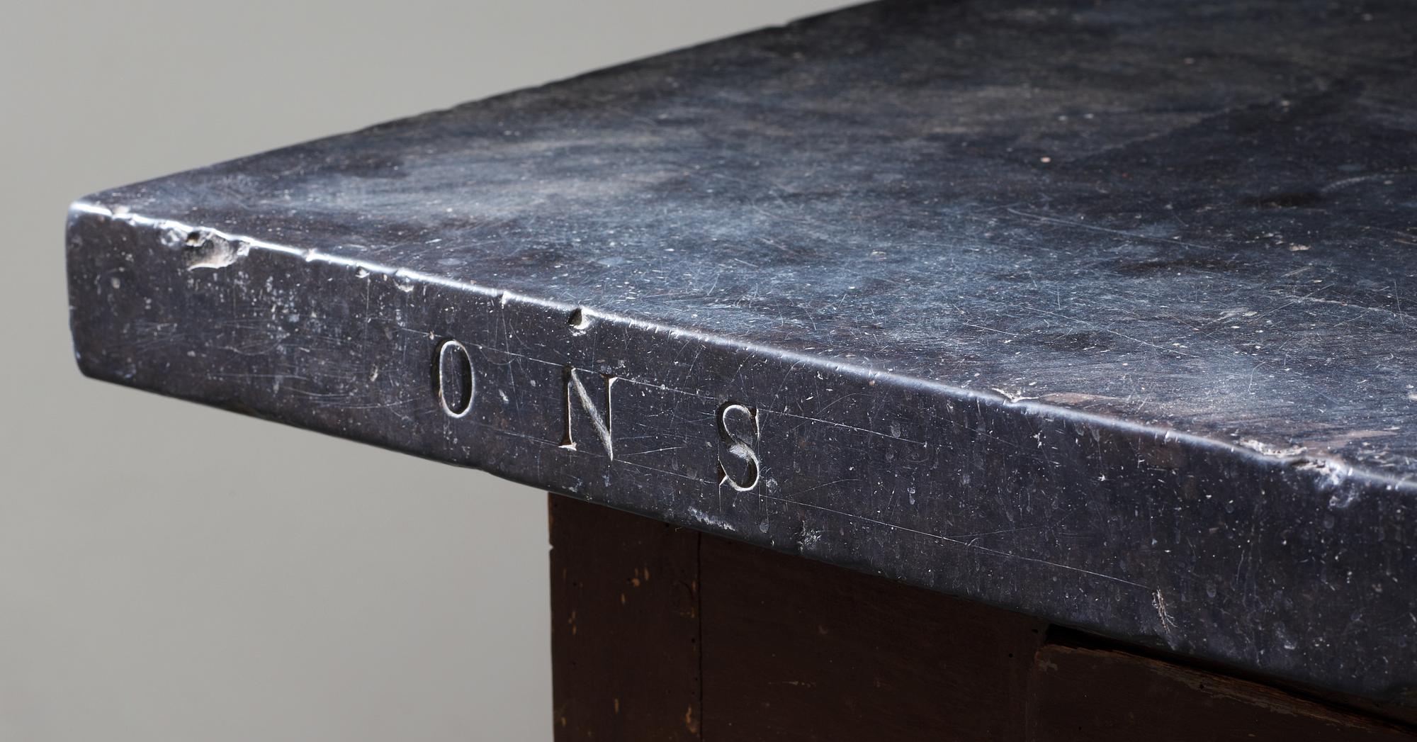 A Swedish 19th century stone top table.